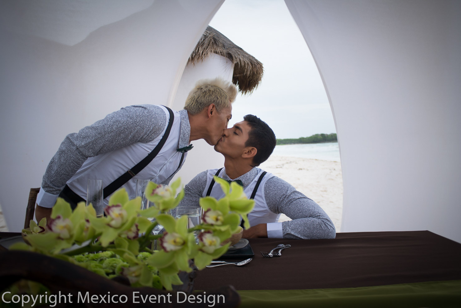 gay male couple kissing Riviera Maya same-sex wedding